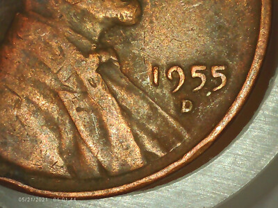 1955-D or 1955-S wheat penny repunched mint mark (RPM) showing doubled mint mark impression below the date